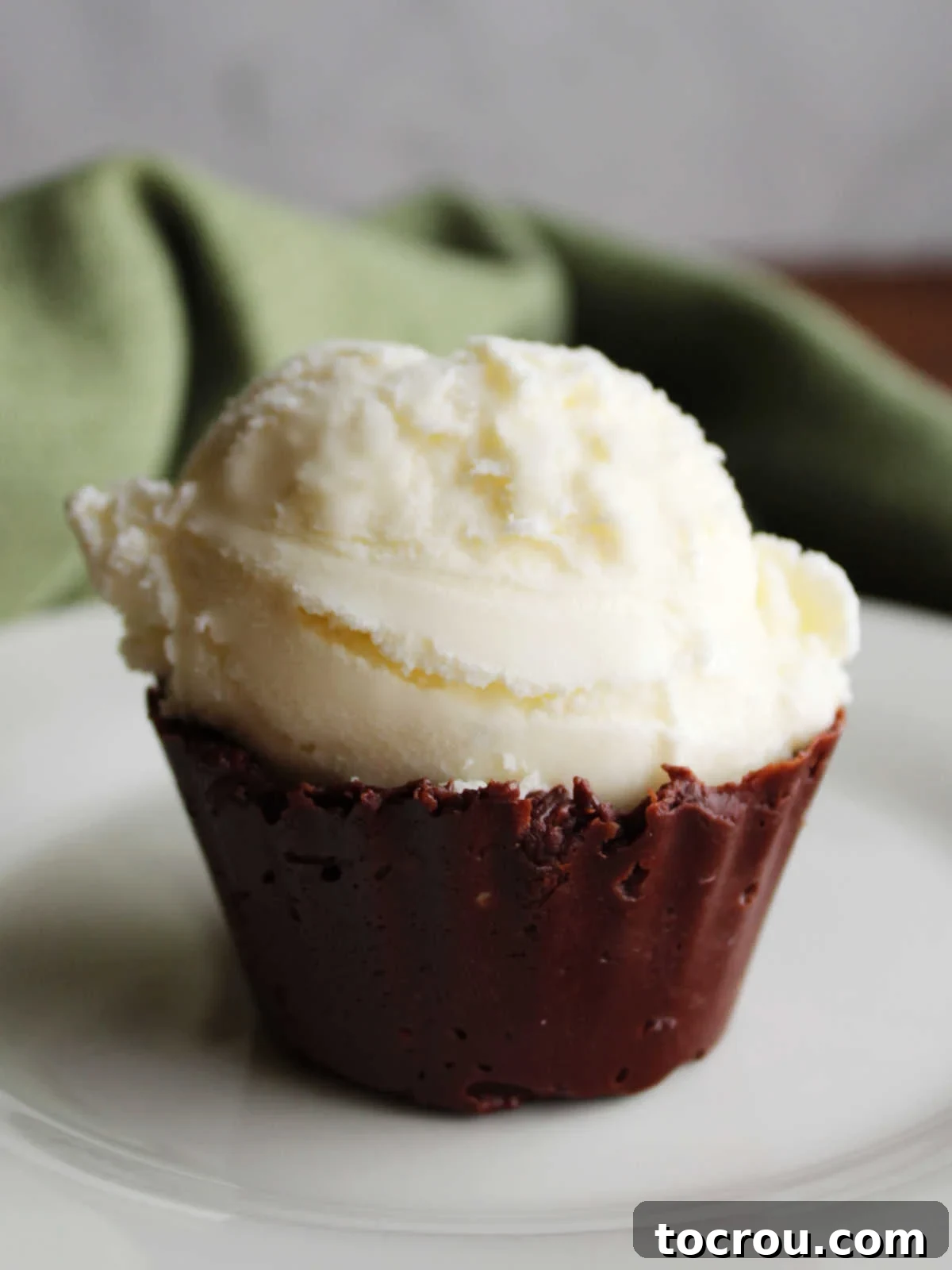 Foolproof Vanilla Ice Cream with Half and Half 3 Scoop of homemade vanilla ice cream on top of fudge ice cream cup.