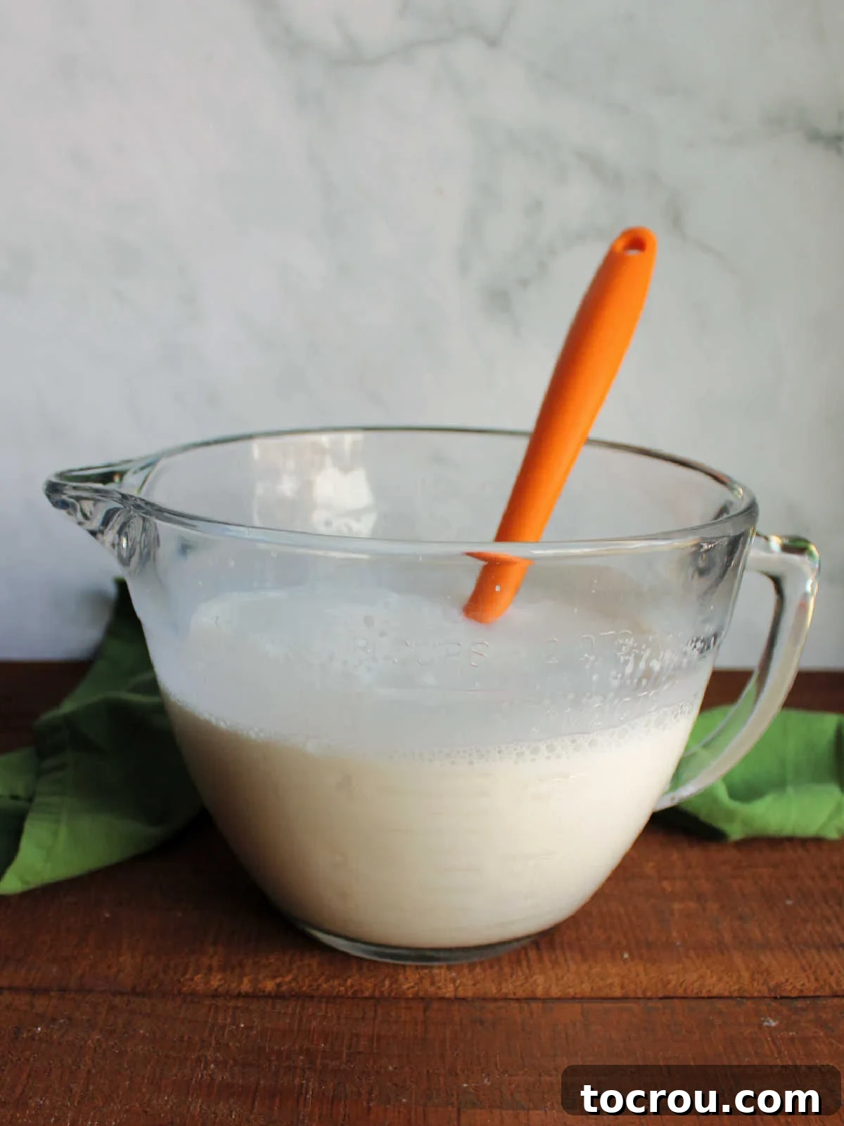 Foolproof Vanilla Ice Cream with Half and Half 5 Glass batter bowl filled with half and half ice cream base.