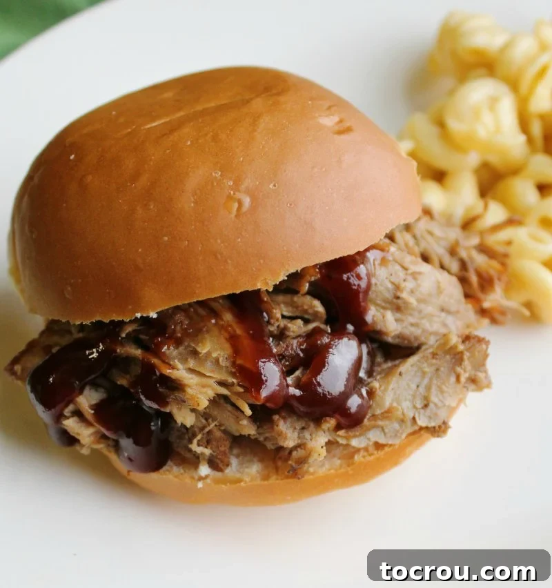 Delicious Instant Pot Root Beer Pulled Pork Sandwich Classic pulled pork sandwich with rich barbecue sauce and a toasted bun.