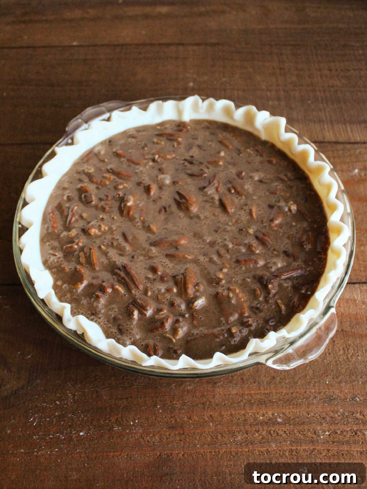 Chocolate condensed milk pie, ready to go in the oven.