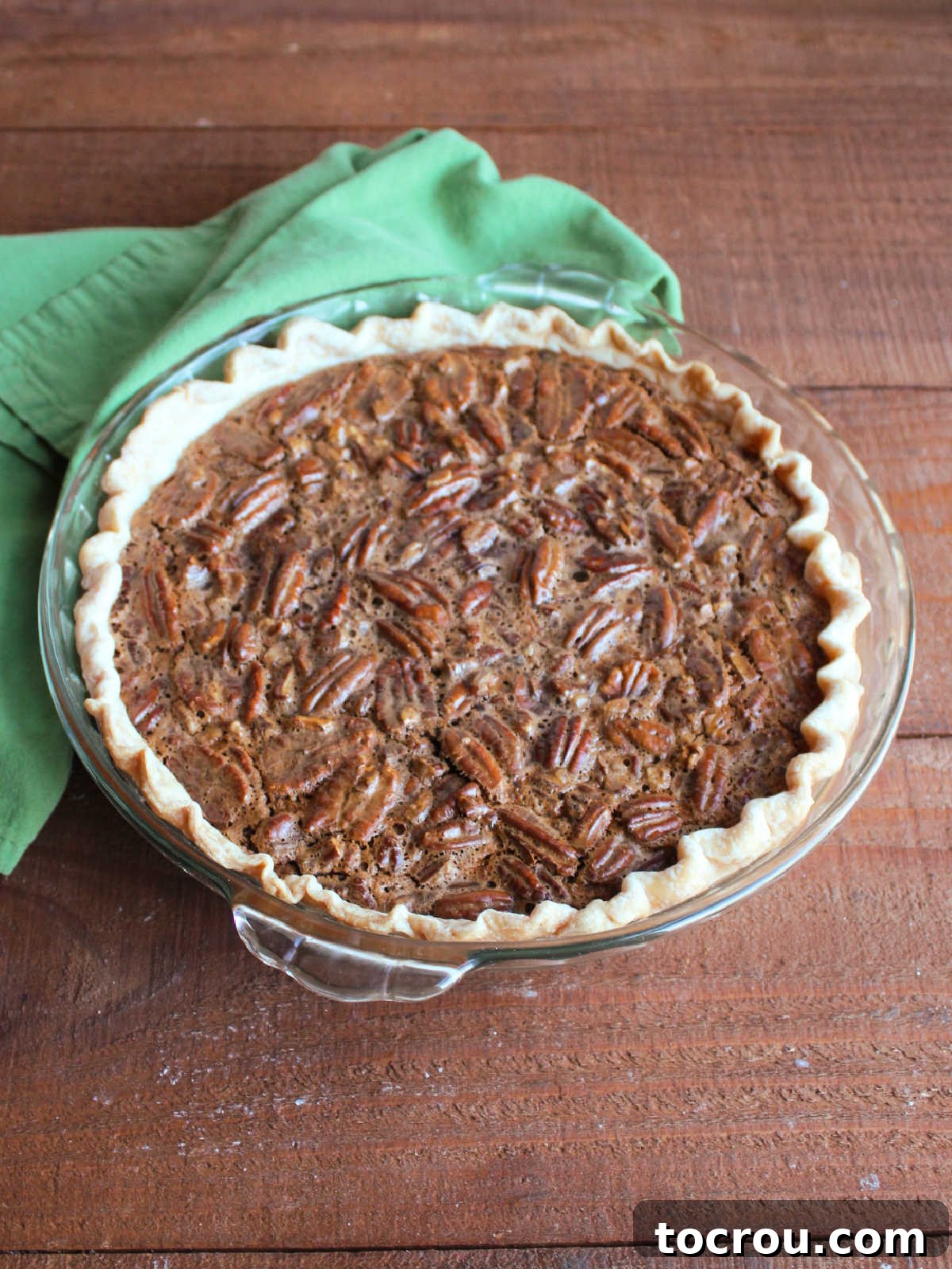 Freshly baked chocolate condensed milk pecan pie.