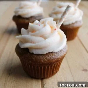 Sweet tea cupcakes with peach buttercream and paper straw decorations.