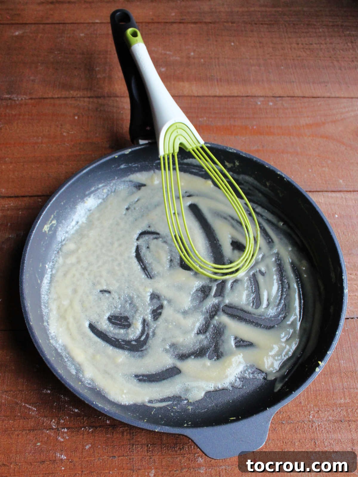 Skillet with lightly colored flour and butter roux.