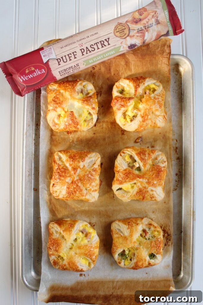 tray of breakfast hand pies fresh from the oven with package of wewalka puff pastry.