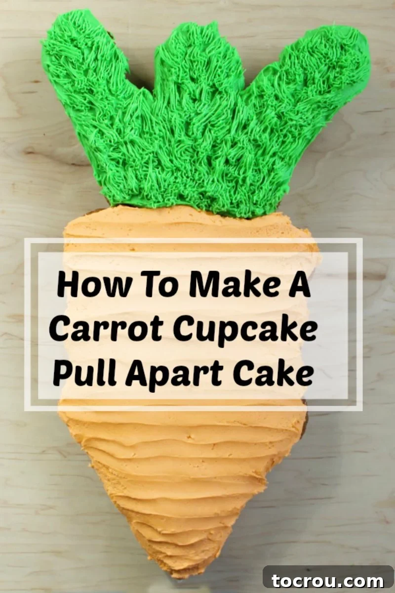 Pull-Apart Carrot Cake: A Cupcake Masterpiece 10 The completed carrot-shaped pull-apart cupcake cake, boasting vibrant orange frosting for the carrot and textured green fronds, beautifully presented on a rustic wooden board. This inviting dessert is ready to be served at any springtime celebration, from Easter to garden parties.