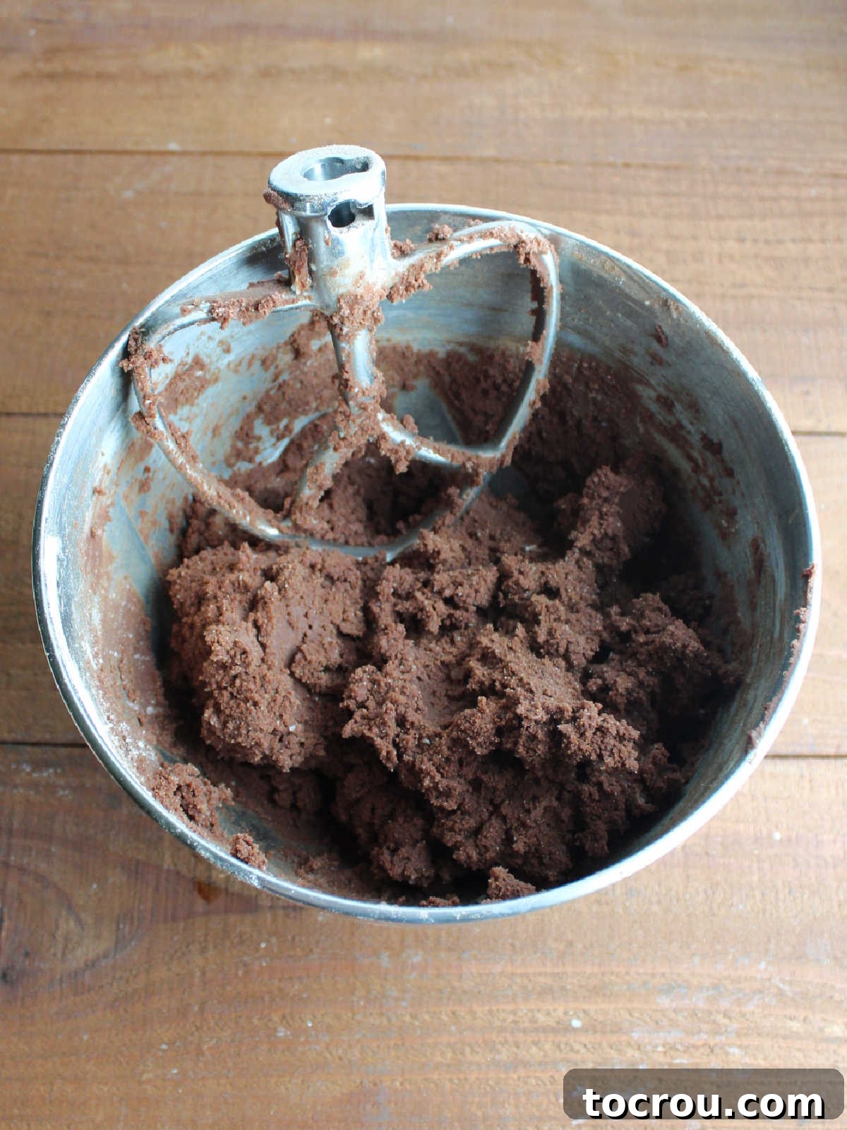 Fudgy Paw Print Double Chocolate Cookies 4 Mixer bowl with soft chocolate cookie dough ready to be scooped.