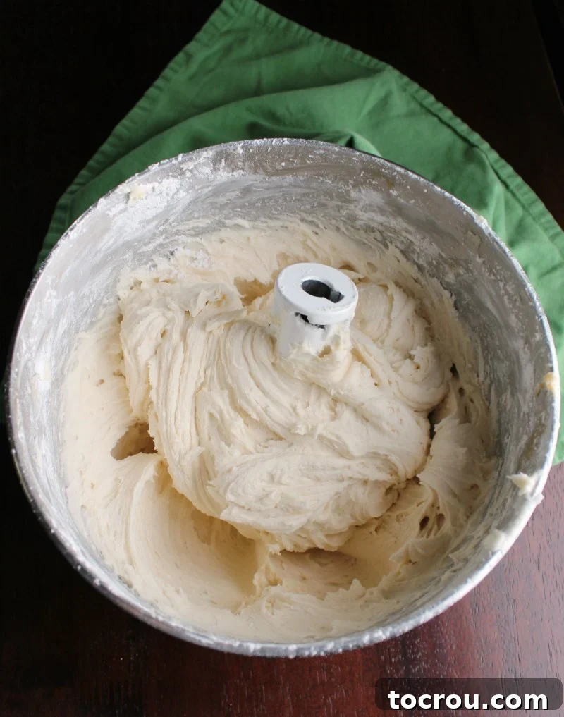 mixer bowl full of easy caramel buttercream frosting.