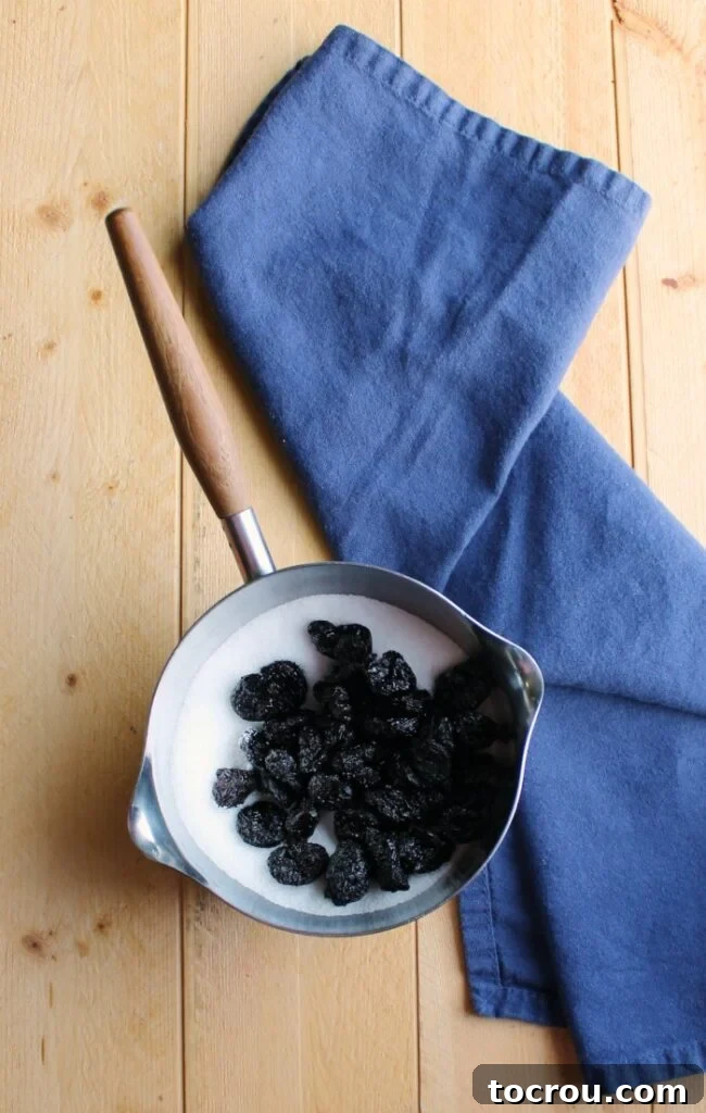 sugar and dried cherries in small saucepan to make cherry syrup.