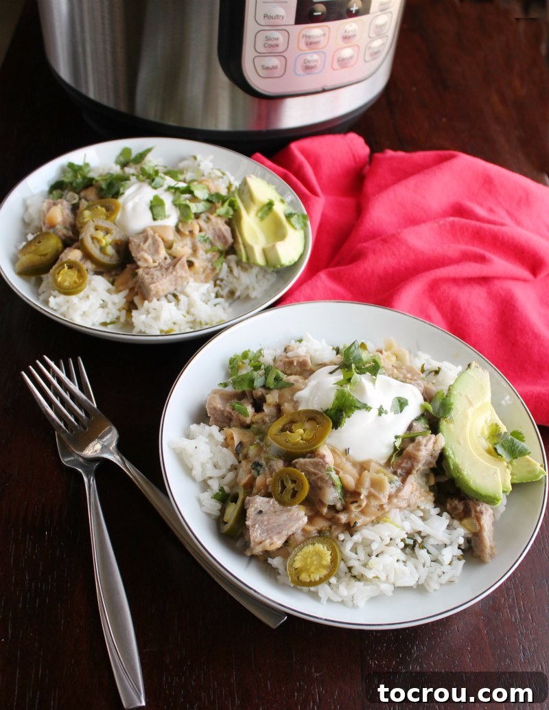 Zesty Instant Pot Salsa Verde Pork 5 An array of delicious pork burrito bowls garnished with fresh toppings, set against the backdrop of a gleaming Instant Pot.