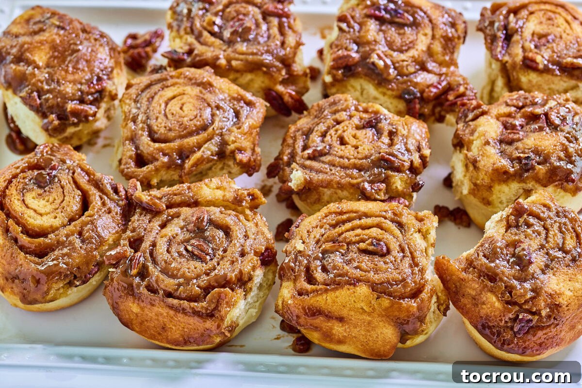 Platter of gooey sticky buns, ready to eat.