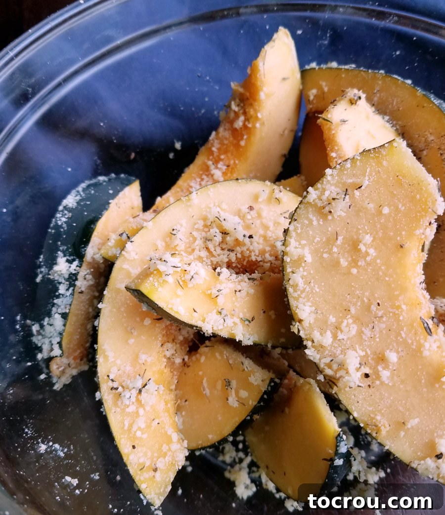 Crispy Parmesan Air-Fried Acorn Squash 3 bowl full of raw acorn squash tossed with parmesan cheese and herbs ready to go in air fryer.