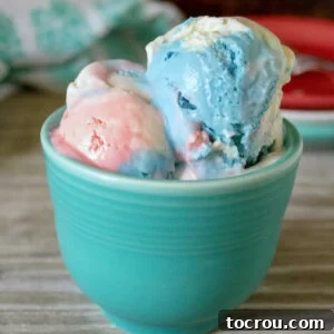 blue mug filled with red white and blue ice cream