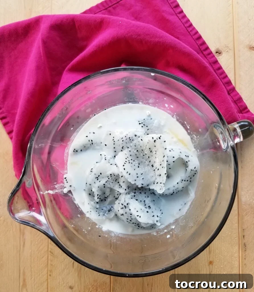 Enchanted Dragonfruit Pie 3 white dragon fruit flesh with black seed specks in bowl.