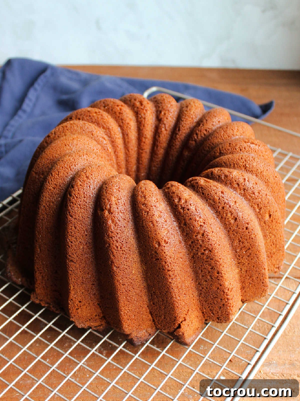 Fluted pound cake after it was turned out onto a wire rack, cooling completely.