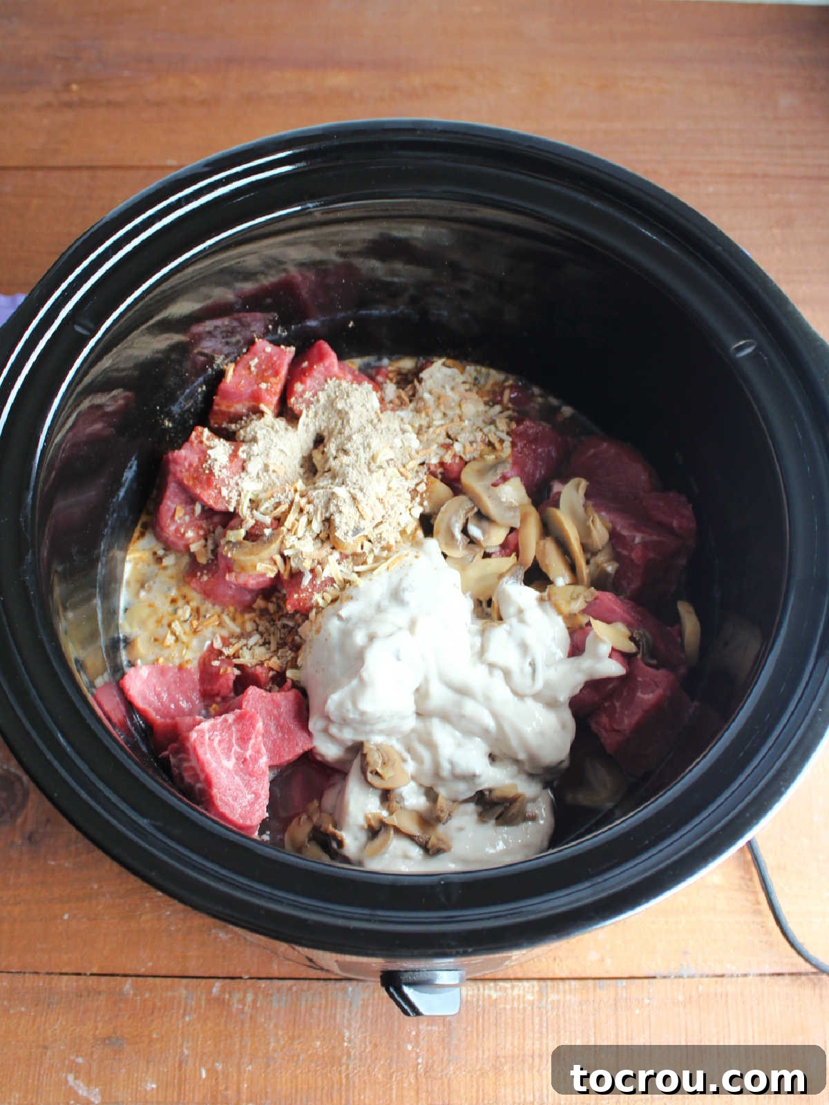 Ingredients for mystery roast in crockpot, ready to cook.