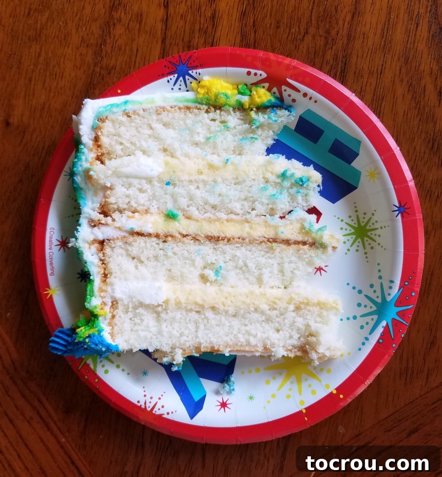 Effortless Pudding Cake Layer 3 slice of layered white cake with vanilla pudding filling.