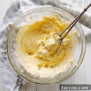 glass bowl filled with vanilla pudding cake filling.