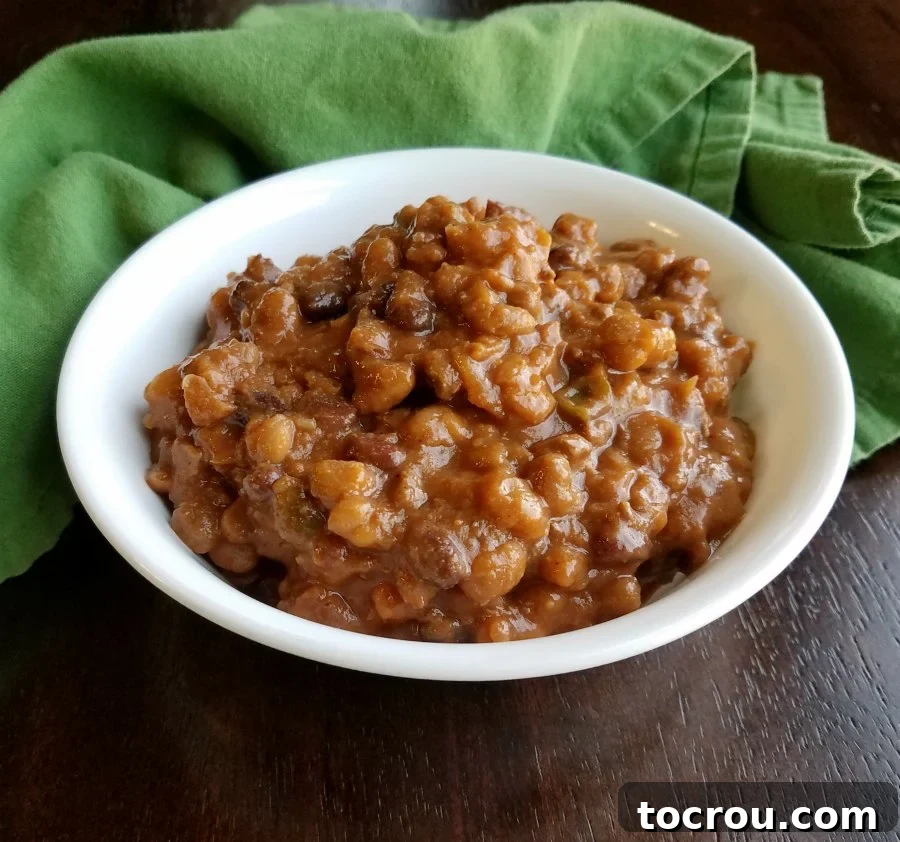Smoky Slow Cooker Chuckwagon Beans 5 bowl of cowboy beans ready to eat.