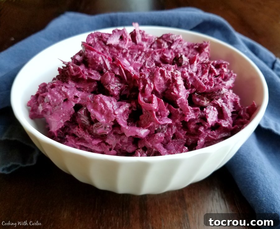 A close-up shot of a bowl generously filled with creamy sour cream beet salad, ready to be enjoyed.