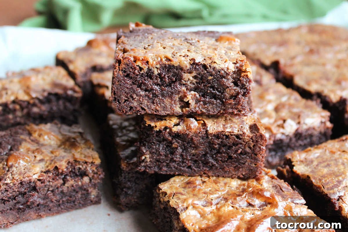 Thick fudge brownies made from a brownie mix with a swirl of condensed milk baked inside to make them ever richer and more delicious.