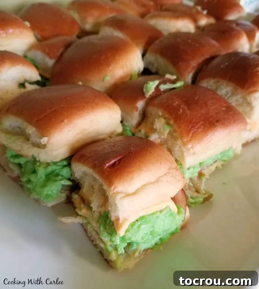 Green Eggs and Ham Sliders Green Eggs and Ham slider sandwiches ready to be served at a Dr. Seuss themed party.