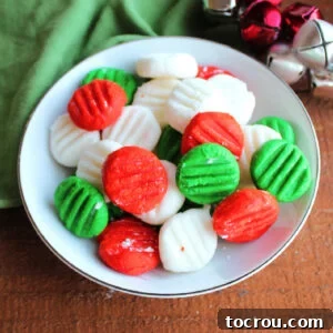 Creamy Dream Mints 9 Bowl filled with red, white, and green homemade cream cheese mint candies.