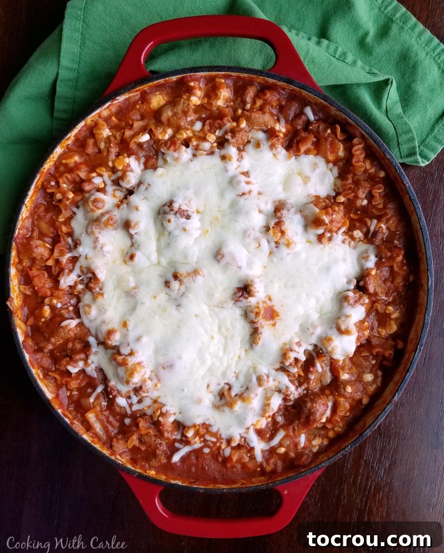 Finished one pot skillet lasagna in cast iron pan, ready to serve.