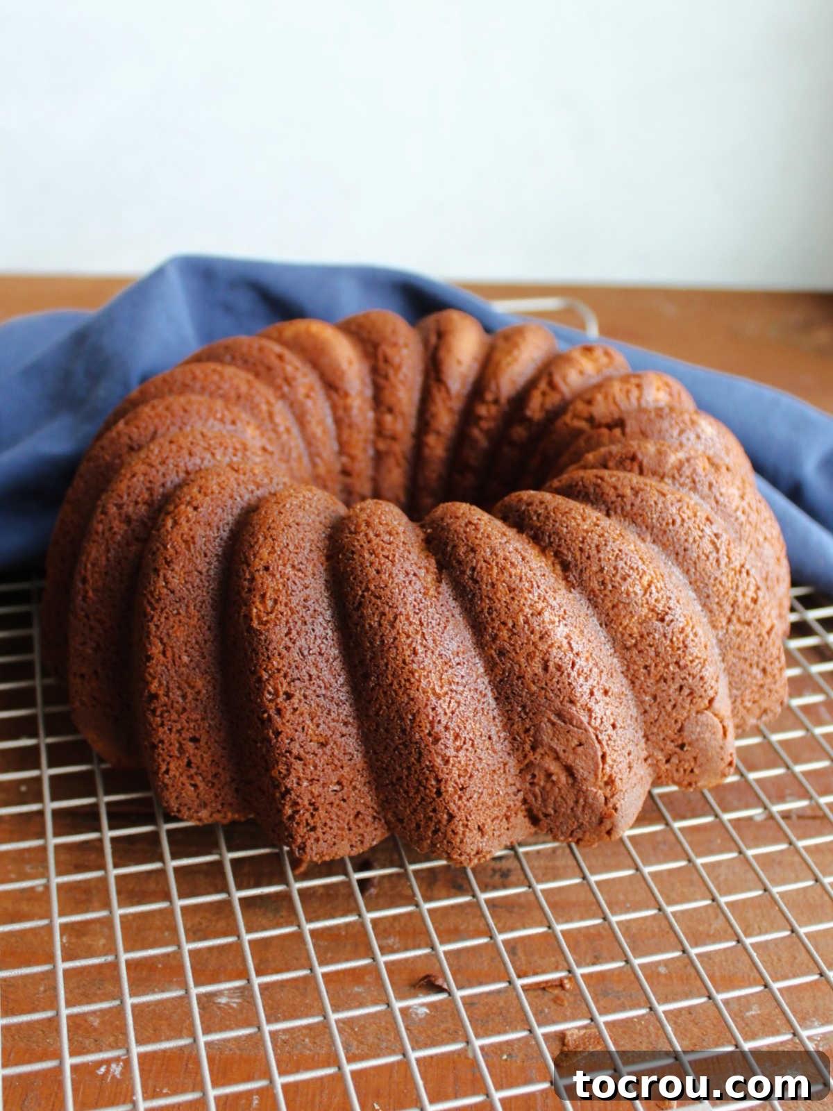 Cooling Pound Cake A beautiful brown sugar pound cake, after being inverted from its Bundt pan, cooling gracefully on a wire rack.