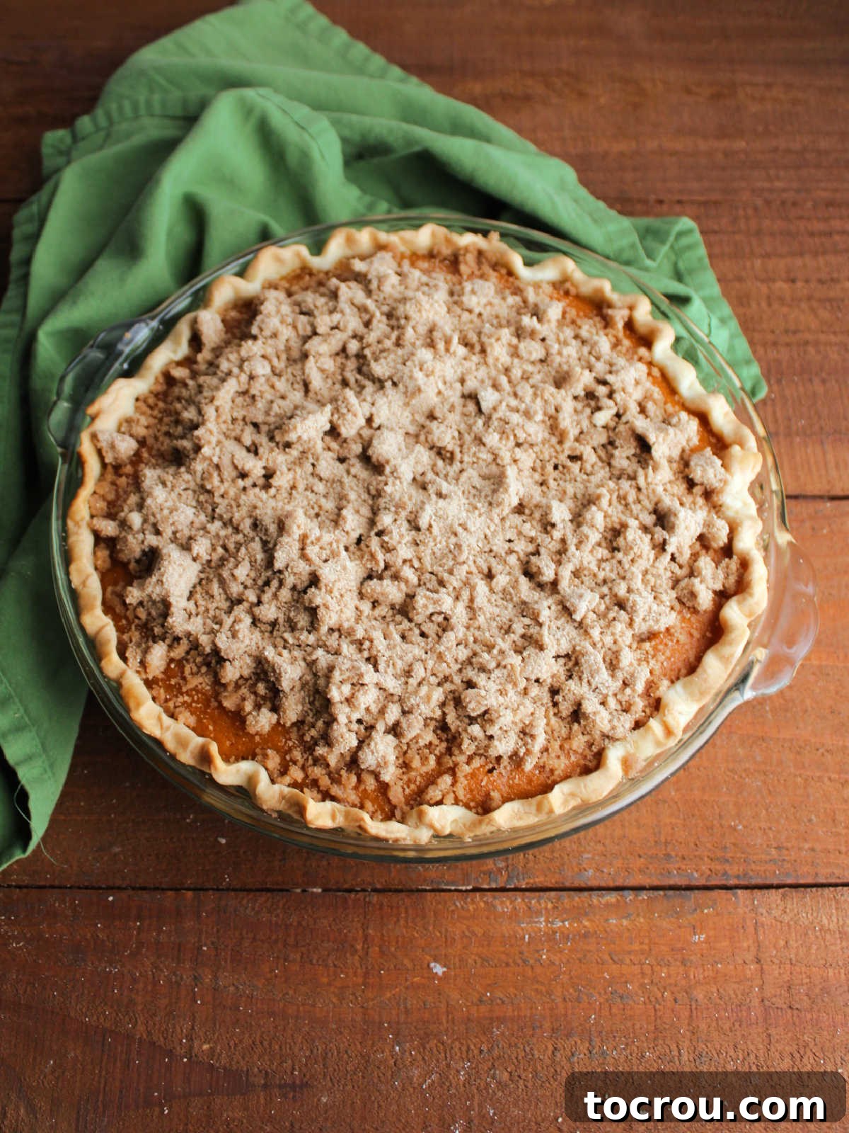Spiced Carrot Pie with Crunchy Cinnamon Streusel 9 Carrot pie topped with crumb mixture, ready to go back in the oven.