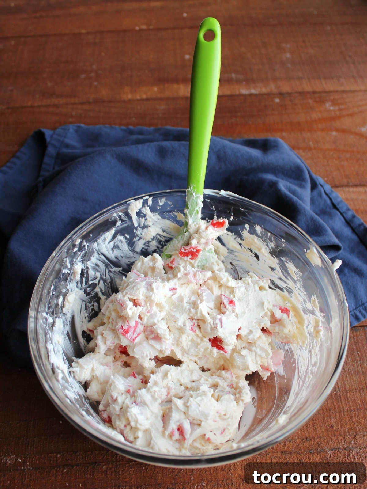 Crab and Cream Cheese Filling Prepared Mixing bowl with the prepared cream cheese and crab mixture, perfectly blended and ready to be used as filling for egg rolls.