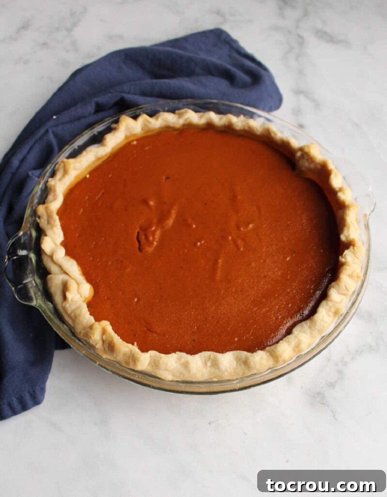 This pumpkin pie, with its subtle maple notes, offers a wonderfully warm and sweet flavor profile, making it truly special.