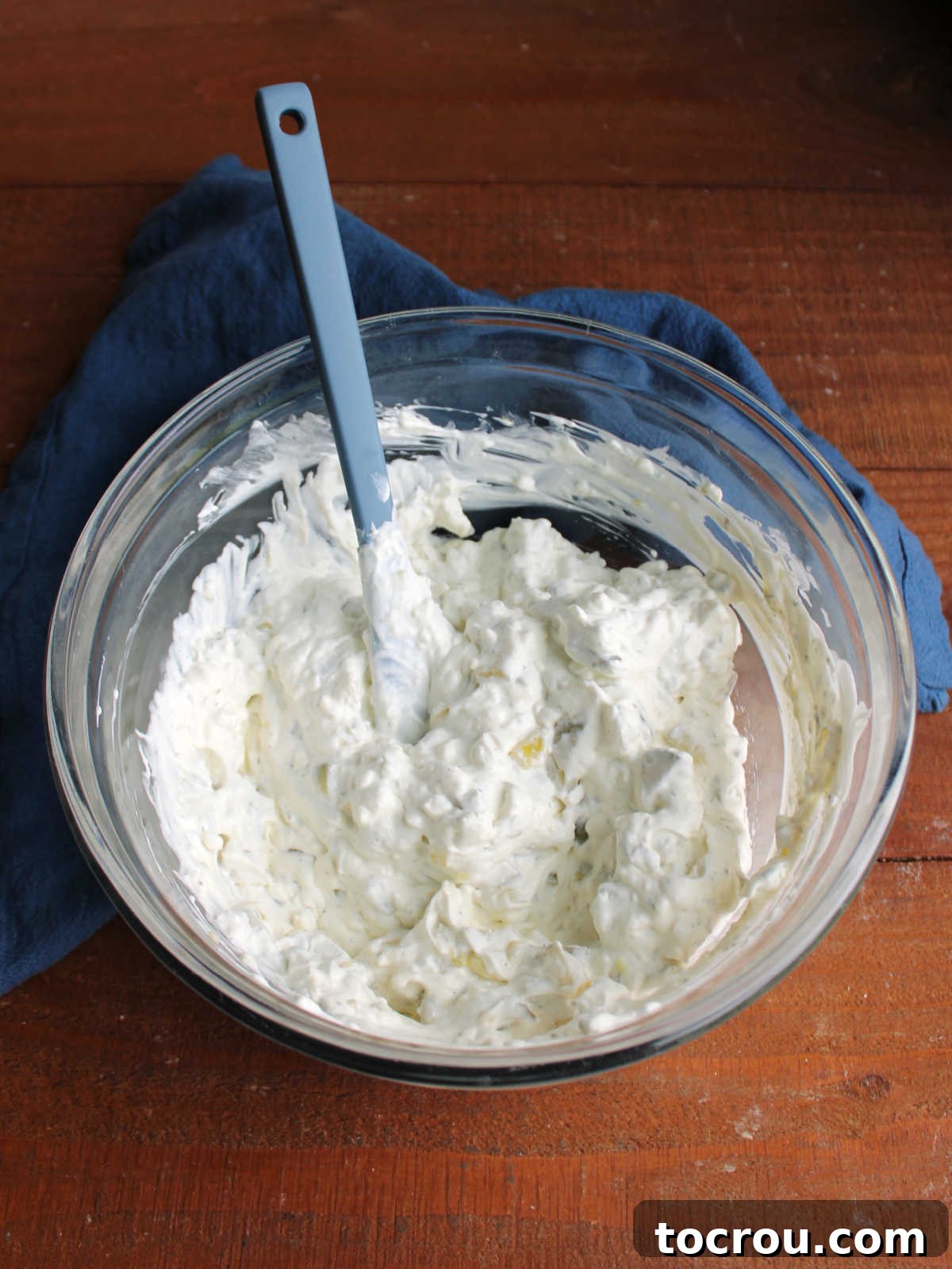 Creamy Dill Delight 4 Mixing bowl of creamy dill pickle dip after everything has been stirred together.