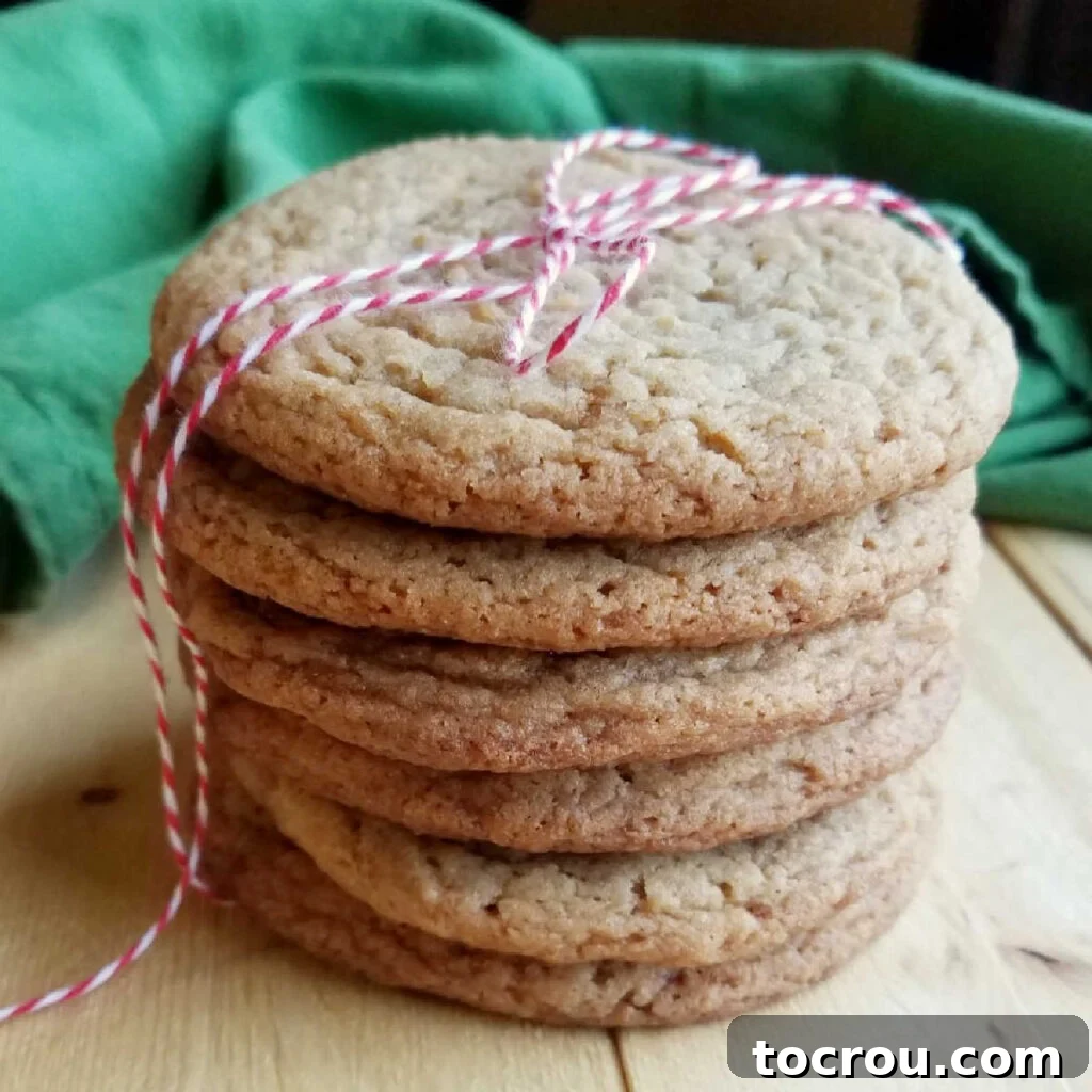 Stack of Cookies Stack of chewy maple cinnamon cookies tied up with red and white baker's twine.