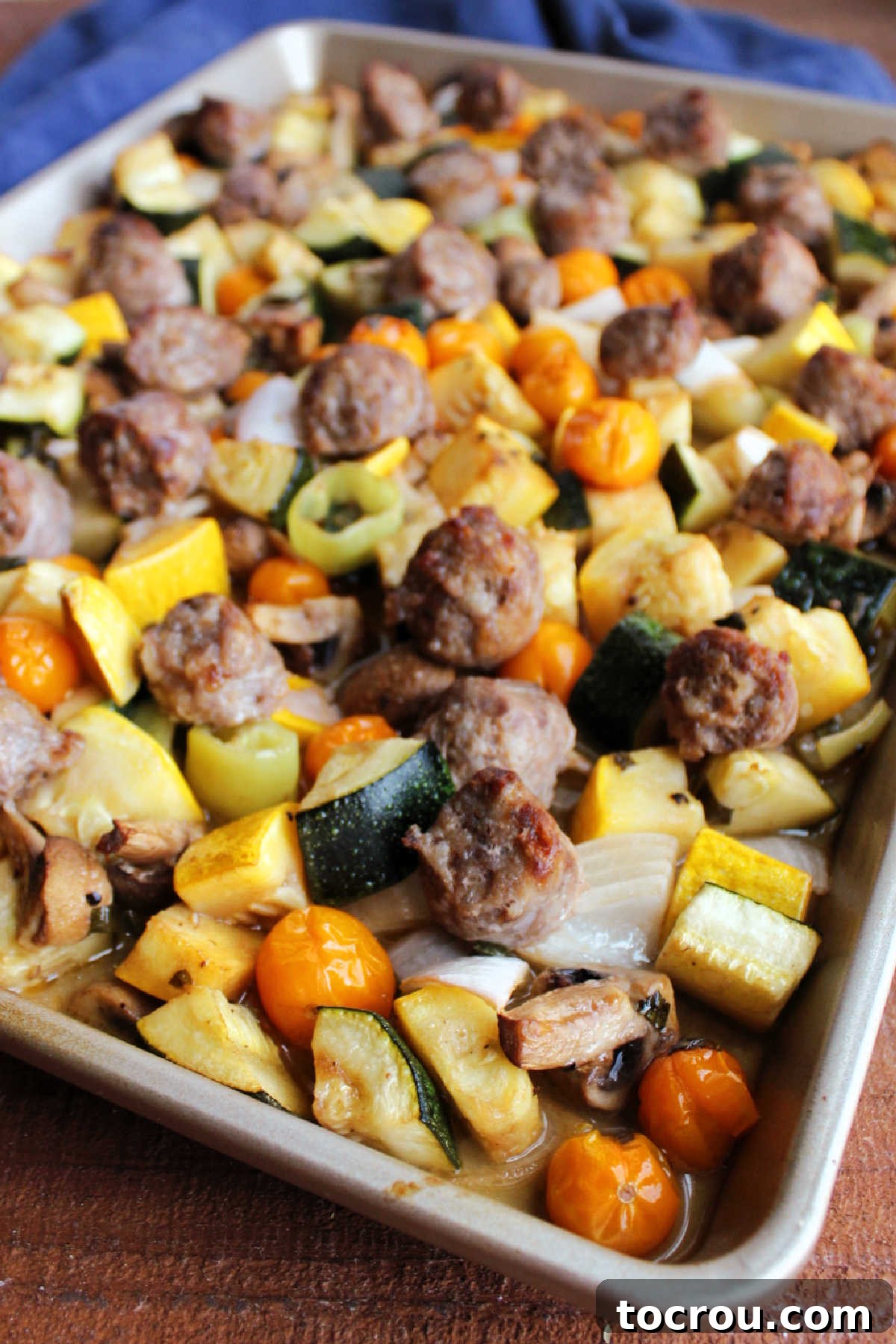 One-Pan Italian Sausage and Roasted Vegetables 8 Sheet pan of roasted vegetables and Italian sausage fresh from the oven.