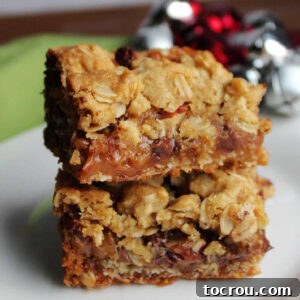 Heirloom Holiday Baking: From Grandma's Cookbook 7 A delectable stack of Caramelitas, showcasing their rich oatmeal crust and gooey centers bursting with caramel, chocolate, and pecans. Each bar promises a decadent bite.