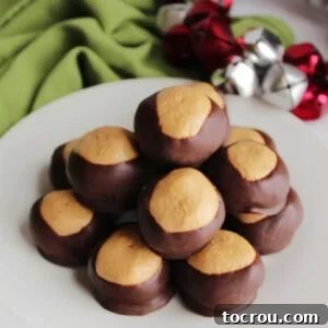 31 Sweet Homemade Treats 17 A tempting pile of buckeyes on a plate, with their creamy peanut butter centers peeking through the rich chocolate shell.