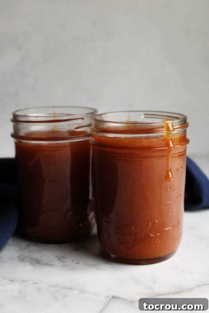 Freshly made, hot dulce de leche in jars, cooling down.