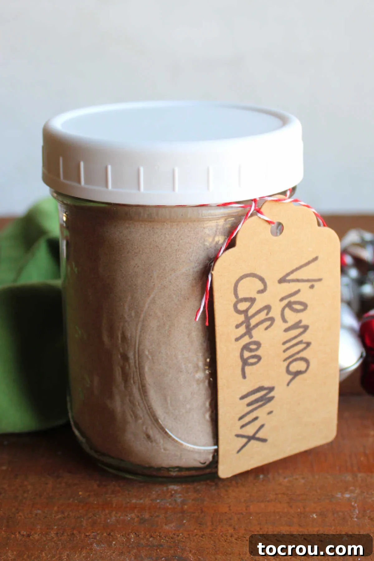 Viennese Coffee Mix as a Gift Jar of homemade viennese coffee mix with a gift tag, ready to be given away.