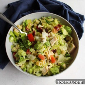 Chicago Chopped Salad Classic 11 Bowl of portillo's style chopped salad with lettuce, pasta, bacon, tomatoes, chicken, cheese and more.