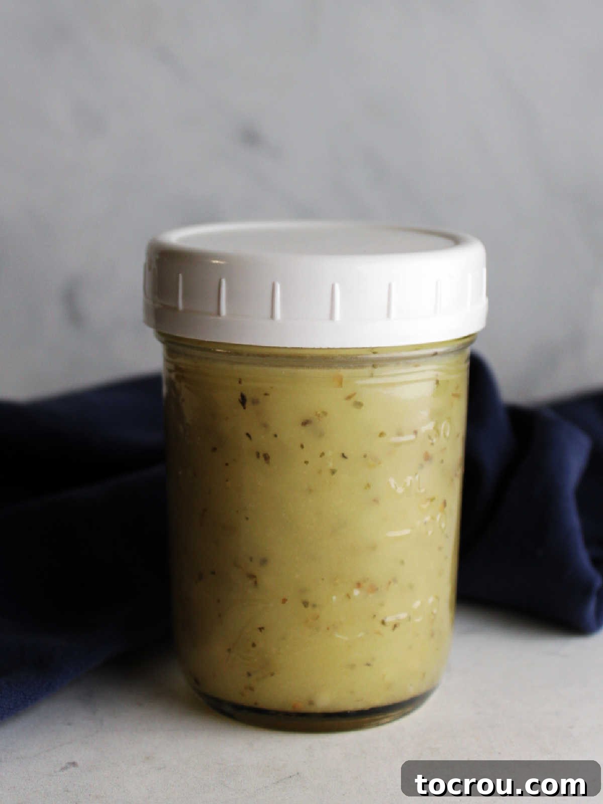 Chicago Chopped Salad Classic 6 Homemade white wine vinaigrette in glass jar.