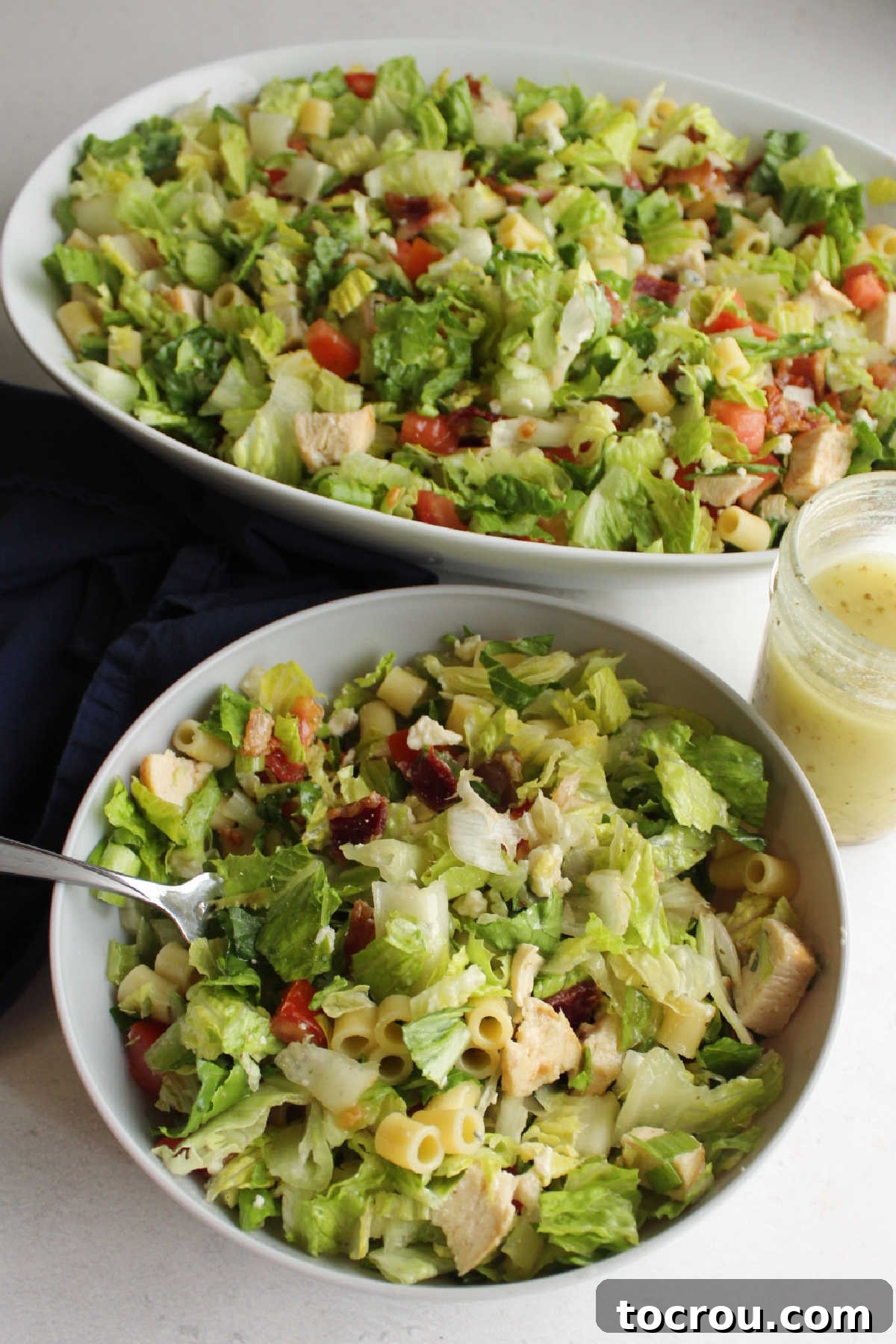 Chicago Chopped Salad Classic 10 Fork getting bite of Portillo's style chopped salad.