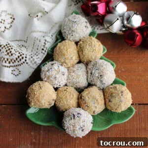 Moose Farts Recipe Image Small Christmas tree plate filled with homemade moose farts candies, some with a graham cracker crumb coating and some with a finely shredded coconut coating.