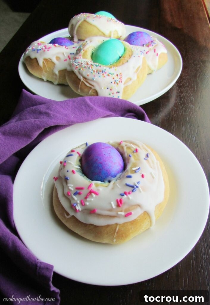 easter breads piled on platter with one on a small plate ready to eat.