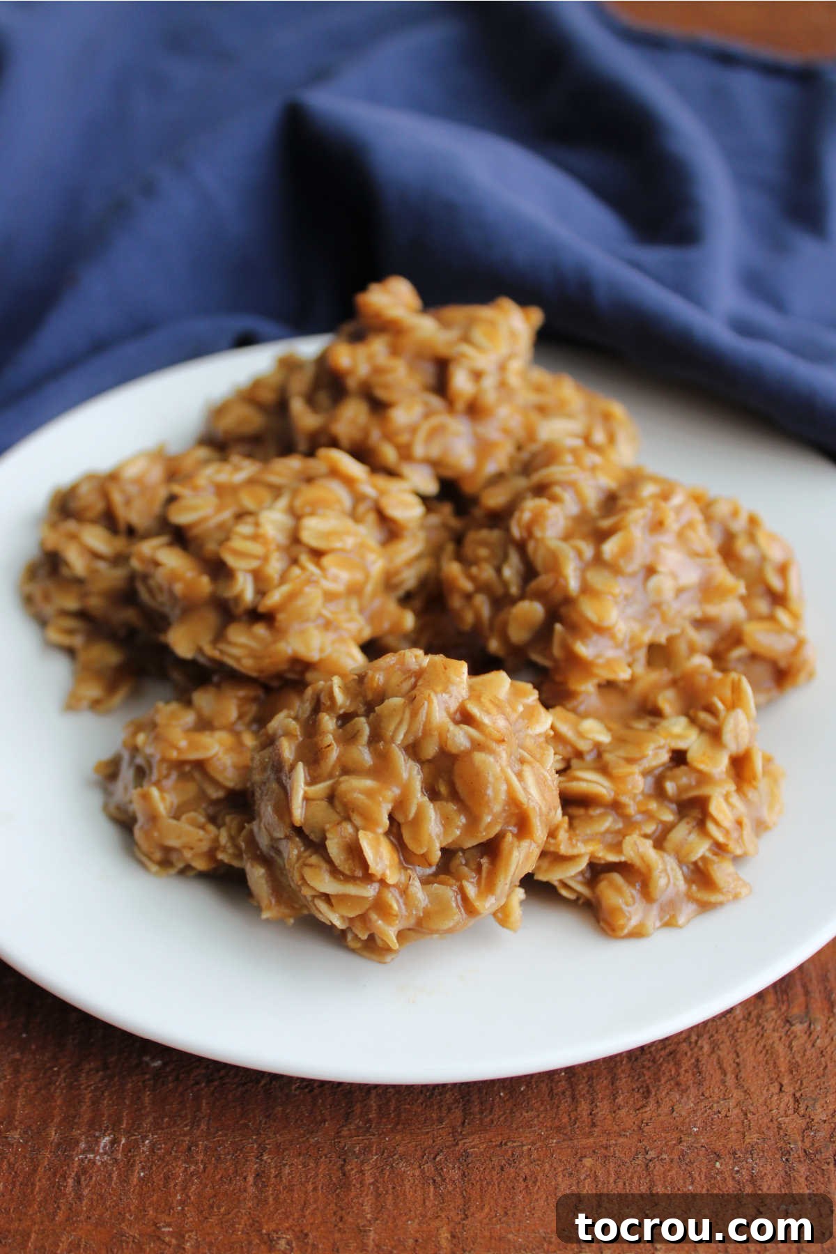 Easy Maple No-Bake Treats 6 Close up of a plate of maple no bake cookies showing the maple mixture holding together the oats to form cookie shapes.