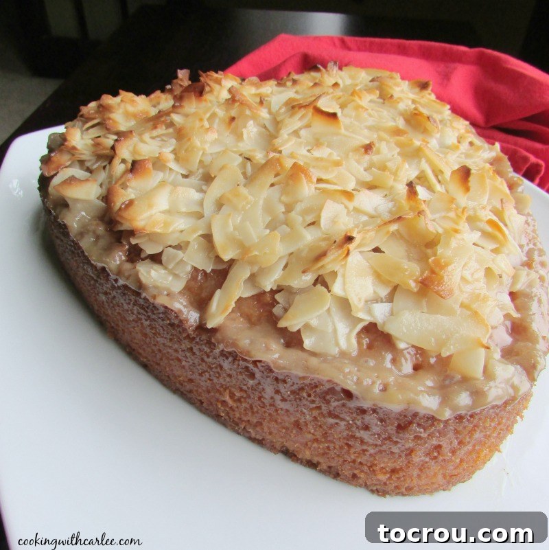 Heart shaped Greek coconut cake presented beautifully on a platter, ready to be served and enjoyed.