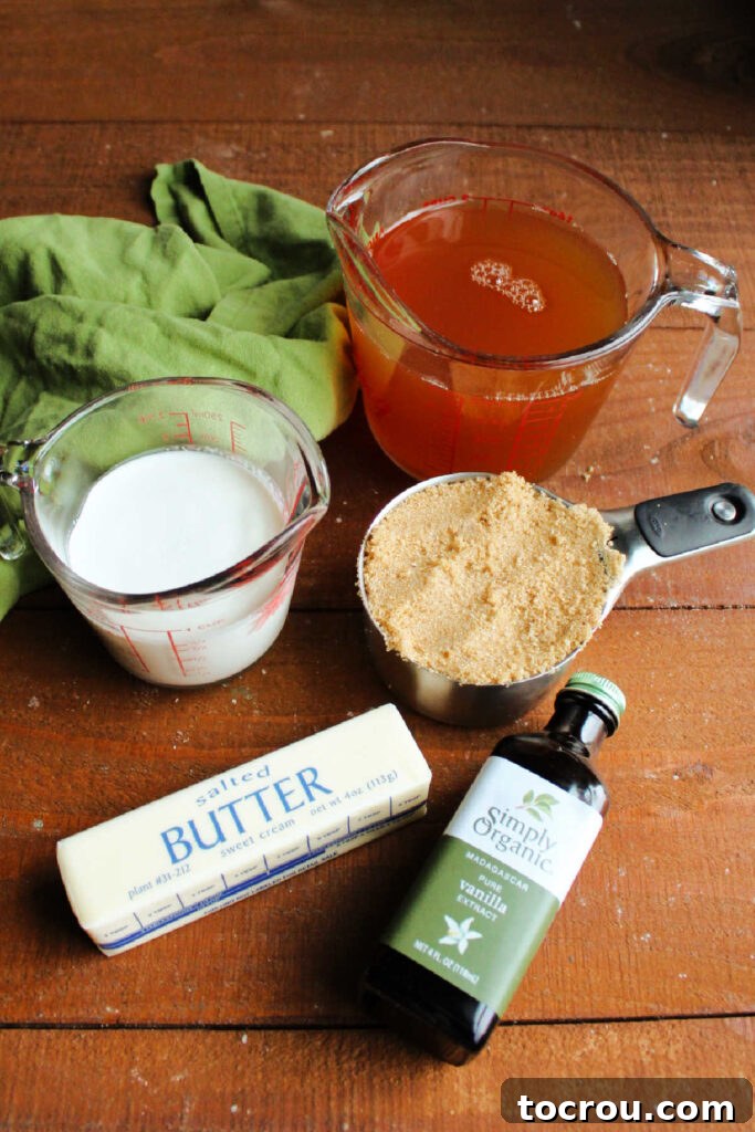 Ingredients like apple cider, brown sugar, cream, butter and vanilla ready to be made into caramel sauce.