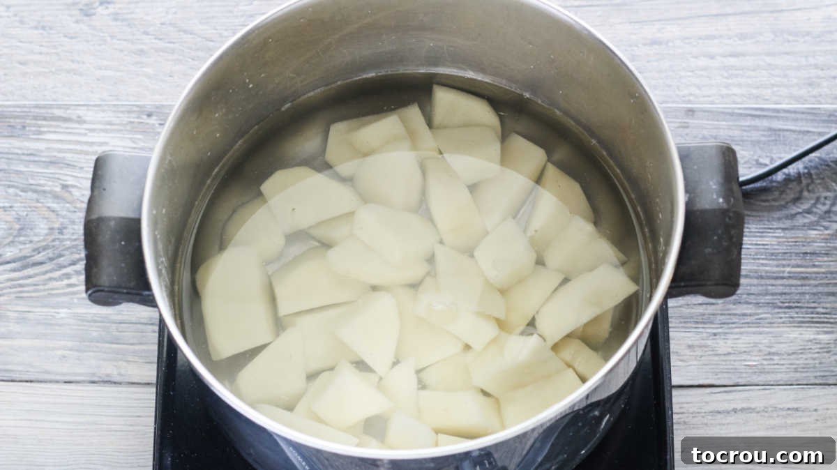 Boiling Potatoes for Dough pan of potatoes boiling for potato dough.