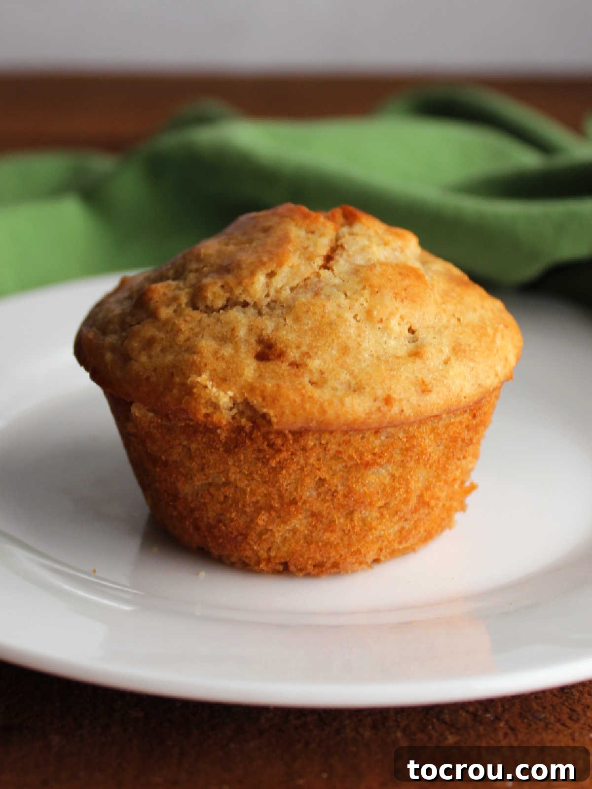 Artisan Sourdough Orange Dream Muffins 7 Orange creamsicle muffin made with oats and sourdough discard on a plate, ready to eat.
