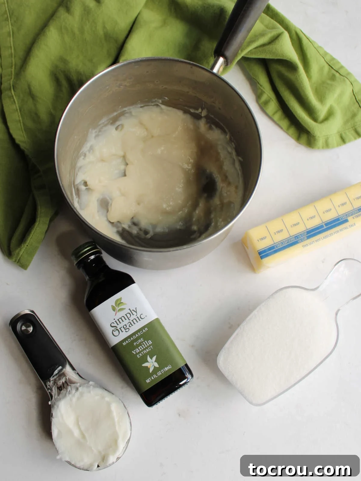 Chocolate Fudge Cream Delight 4 A collection of ingredients for the creamy vanilla filling, including milk, flour, shortening, butter, granulated sugar, and vanilla extract, neatly arranged and ready for use in a clean kitchen setting.