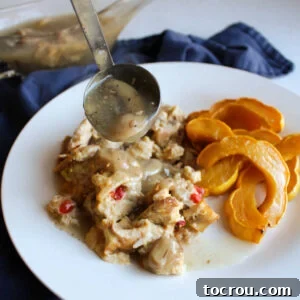 A large turkey and rice casserole serving, perfectly portioned for a big event.